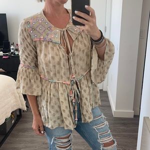 Blue Pearl tie front embellished top